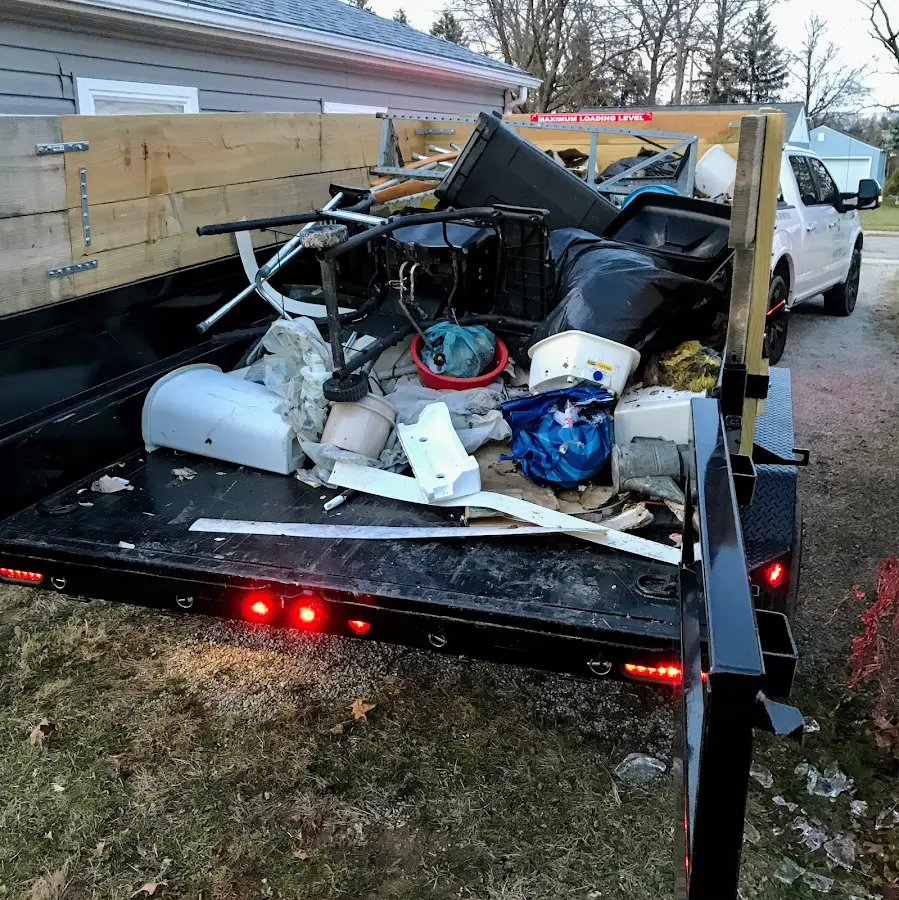 Roll-off dumpster delivered to a residential driveway in Dodge City